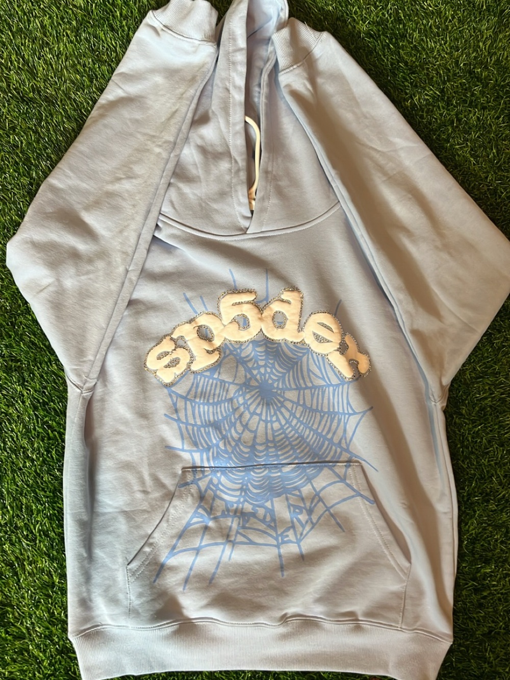 Light Blue Sp5der Graphic Hoodie with Shimmery Logo